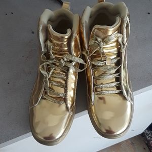 Bright shiny gold high top athletic shoes never wo